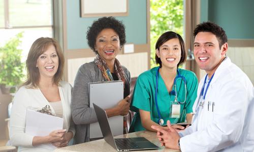 Public Health Nursing Team Smiling in Clinic Office