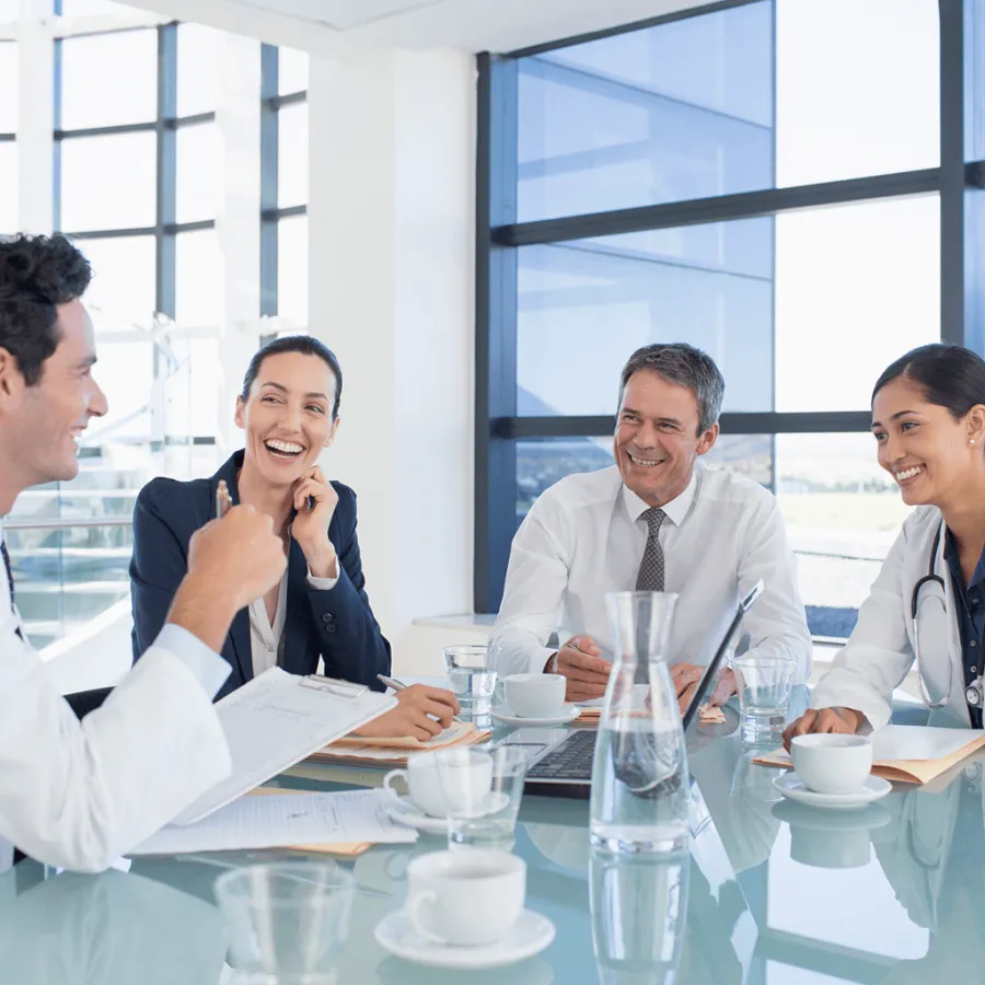 Healthcare team of doctors and public health professionals in meeting